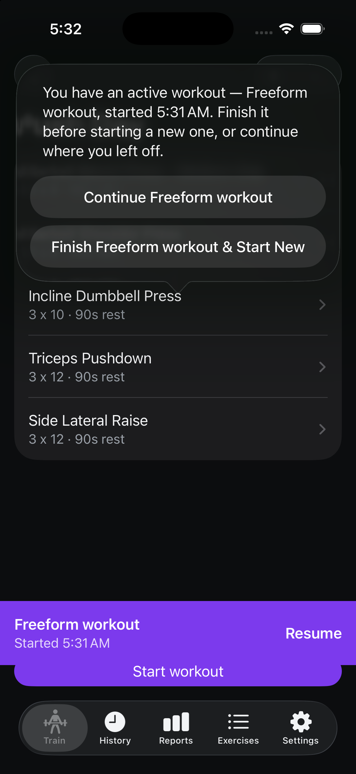 A confirmation dialog reading You have an active workout — Freeform workout, started 5:31 AM. Finish it before starting a new one, or continue where you left off, with Continue Freeform workout and Finish Freeform workout and Start New buttons